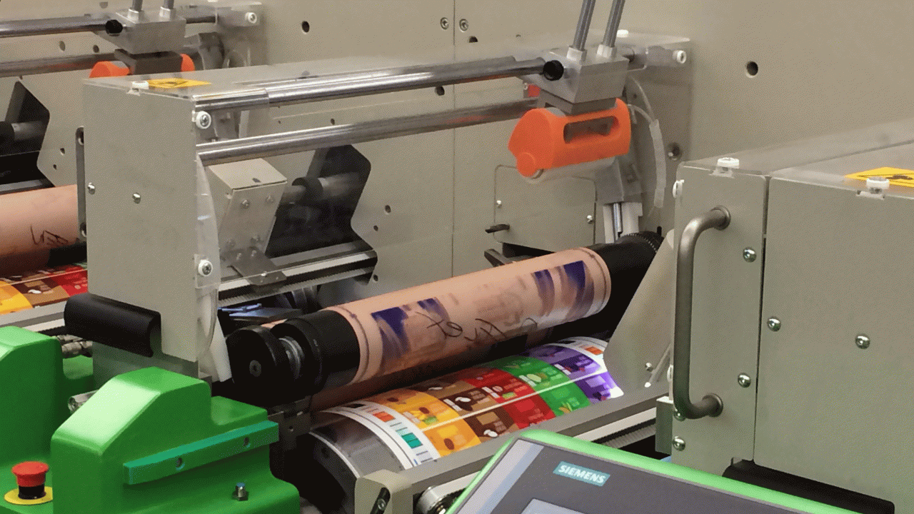 Printing Marvel characters and then automatically moving the plates to print the next job of multiple fruit flavors