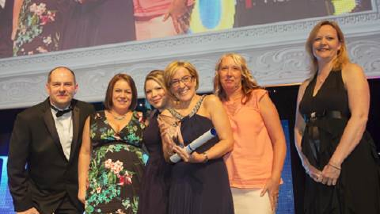 Alison Davidson, customer services manager for Sun Chemical in the UK and Ireland, along with team members collecting their award Alison Davidson, customer services manager for Sun Chemical in the UK and Ireland, along with team members collecting their award