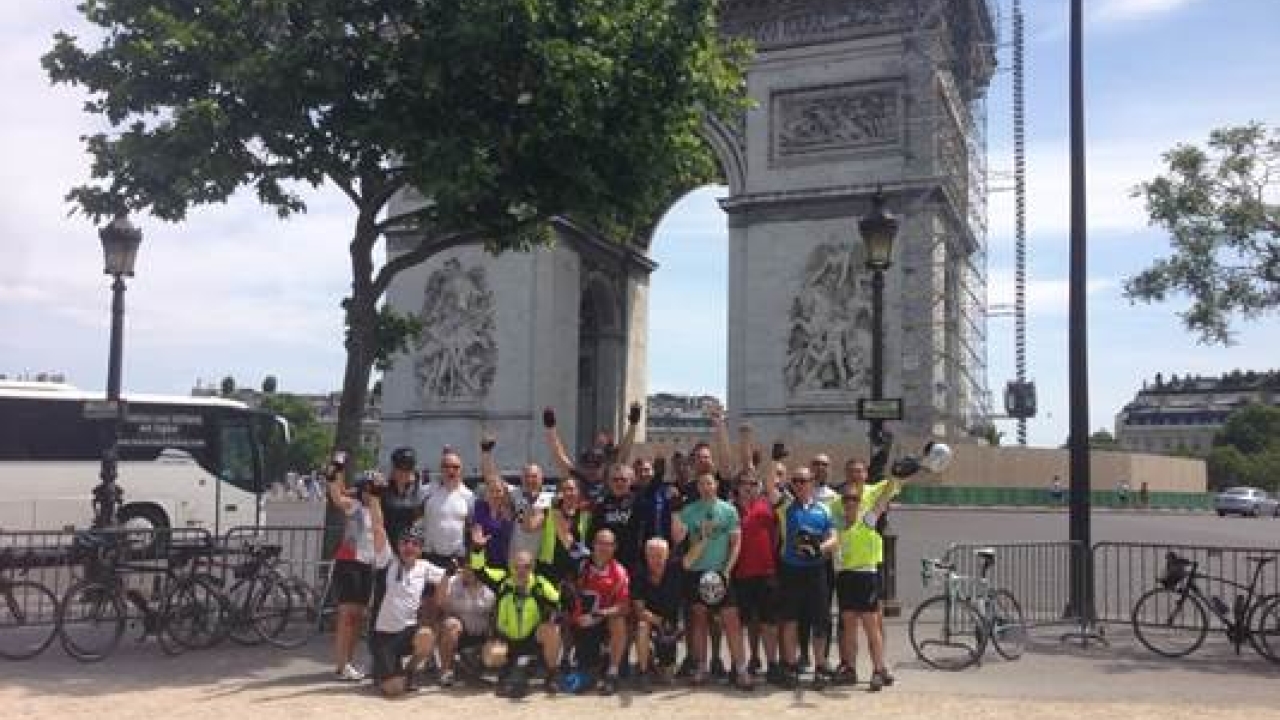 A 23-person team cycled from London to Pairs for Events for Namuwongo
