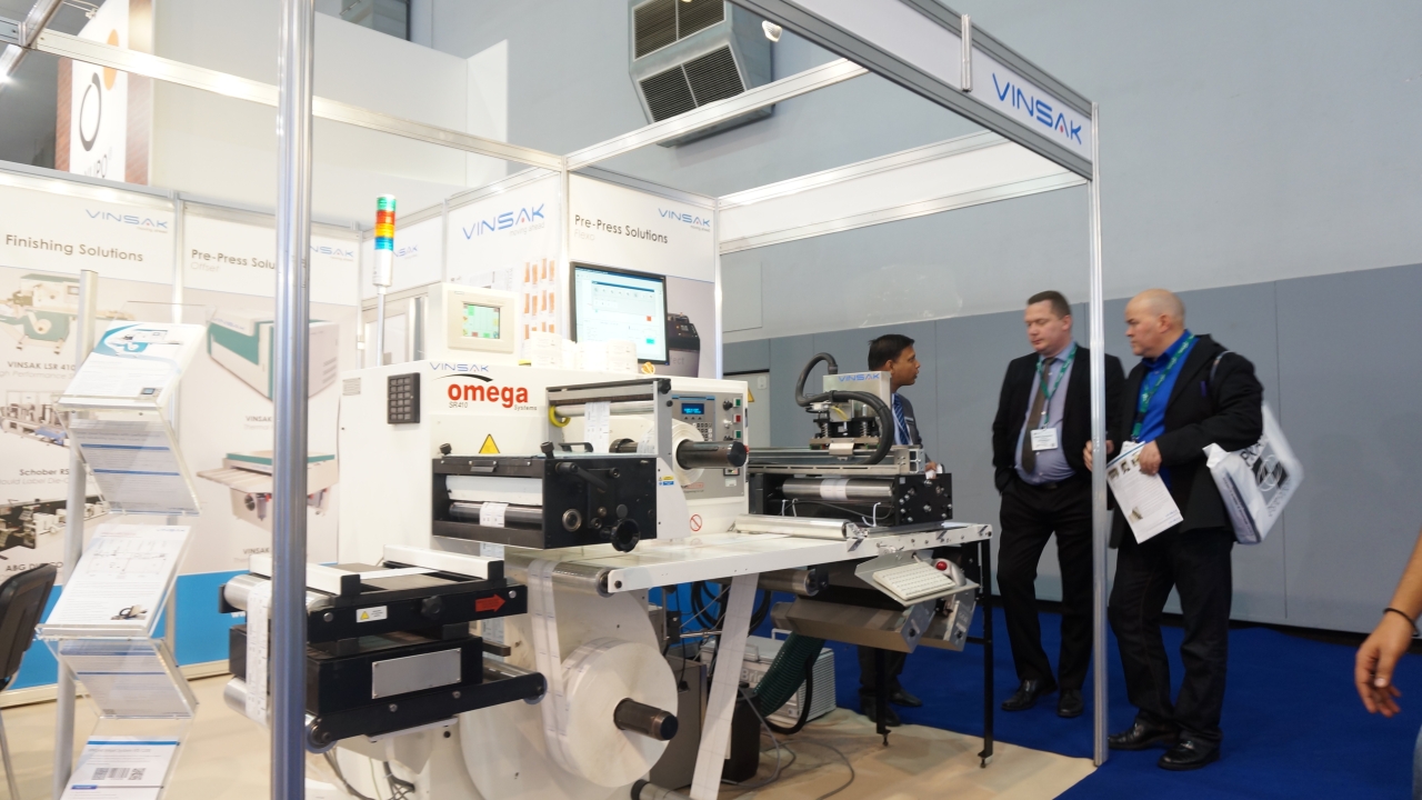 Vinsak Omega SR 410 label inspection slitter rewinder machine on display along with the VIS 1200 inkjet system on display at Labelexpo Europe 2013