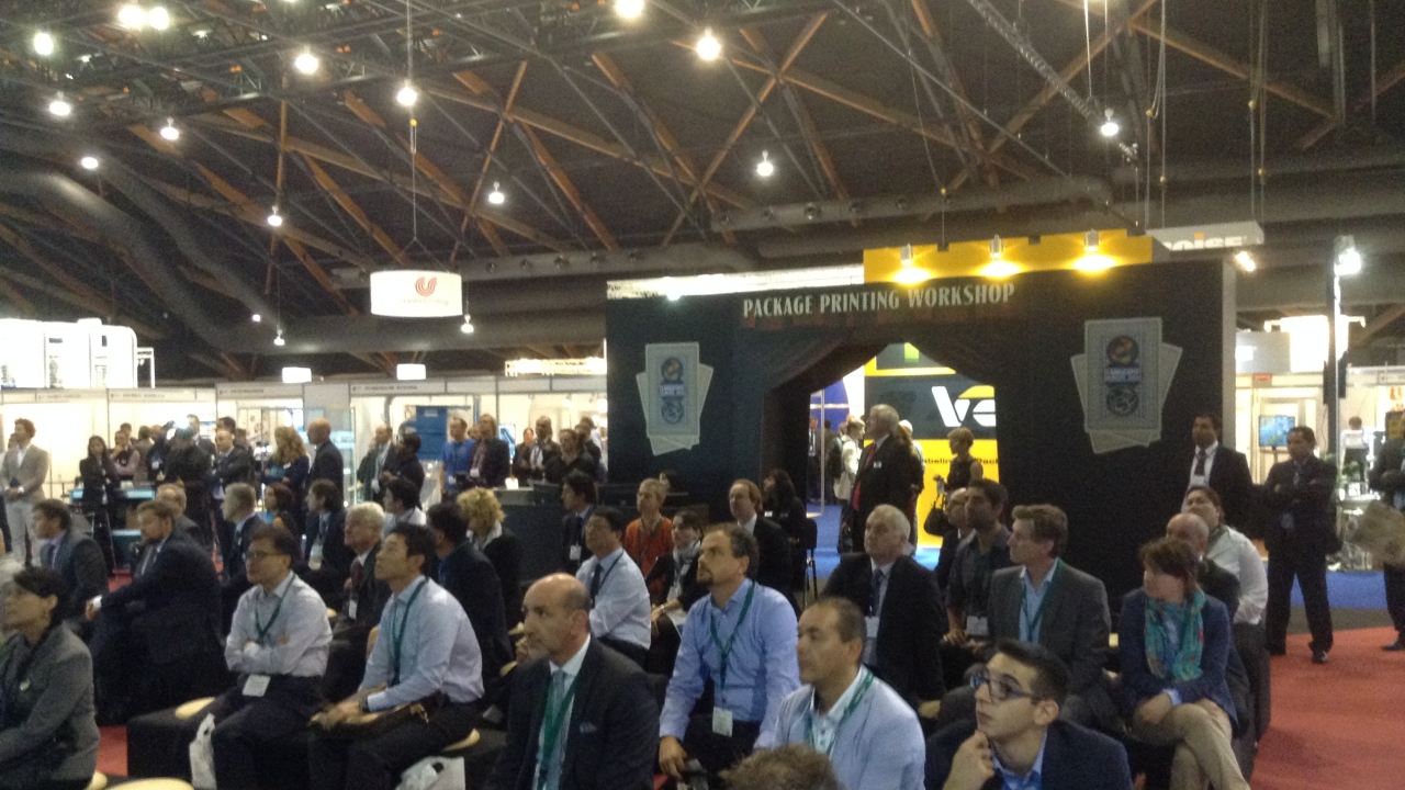 Visitors gathered on the Package Printing Workshop feature area