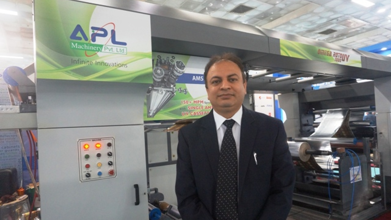 C P Paul of APL Machinery with the new Omega Roto UV 1000 rotogravure UV coating machine