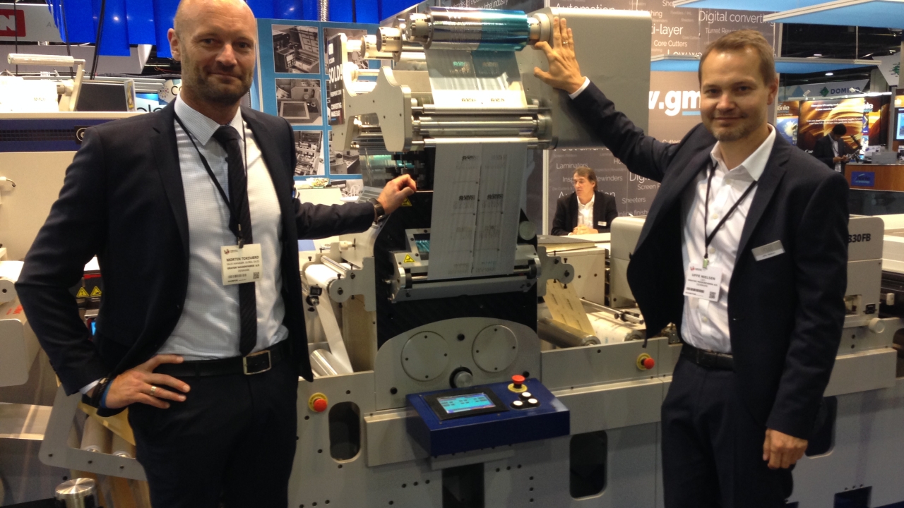 L-R: GM’s Morten Toksværd, global sales manager, and Uffe Nielsen, CEO, with the DC330FB converting line, which has a rotating foil tower