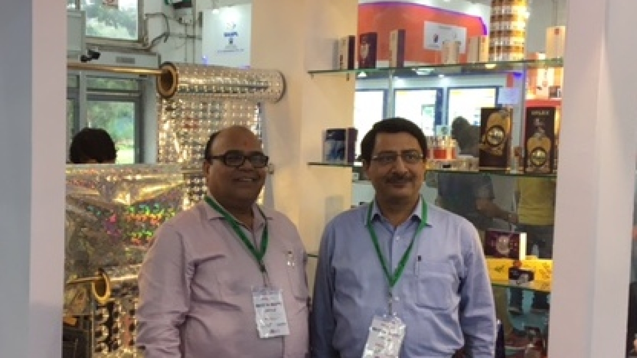 G P Pathak, vice president of operations at Uflex (left) by the holography products manufactured by the business