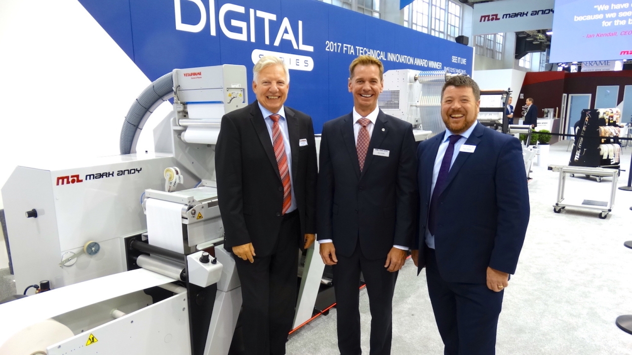Vetaphone’s Frank Eisby (left) and Kevin McKell (right) with Mark Andy’s Steve Schulte (center)