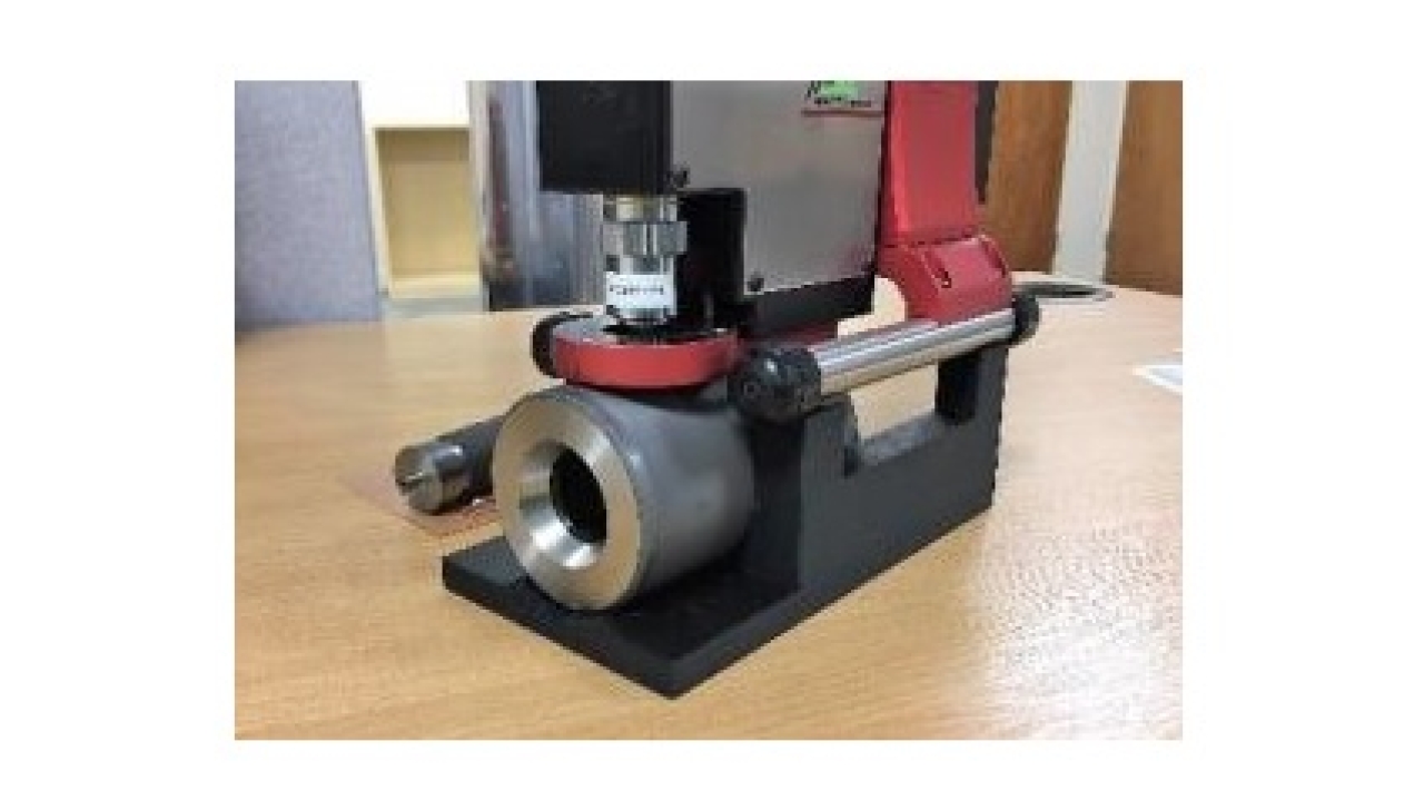 The holder comes in two parts, with the main body supporting larger test aniloxes and a separate holder supporting smaller aniloxes used in handheld test units