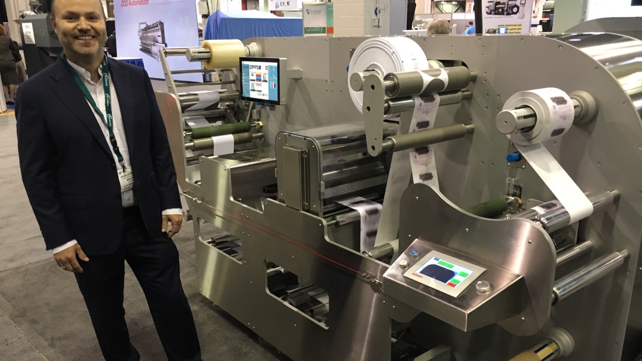 Werosys’ Bjarke Nielsen with the Compact line with integrated digital CMYK inkjet module