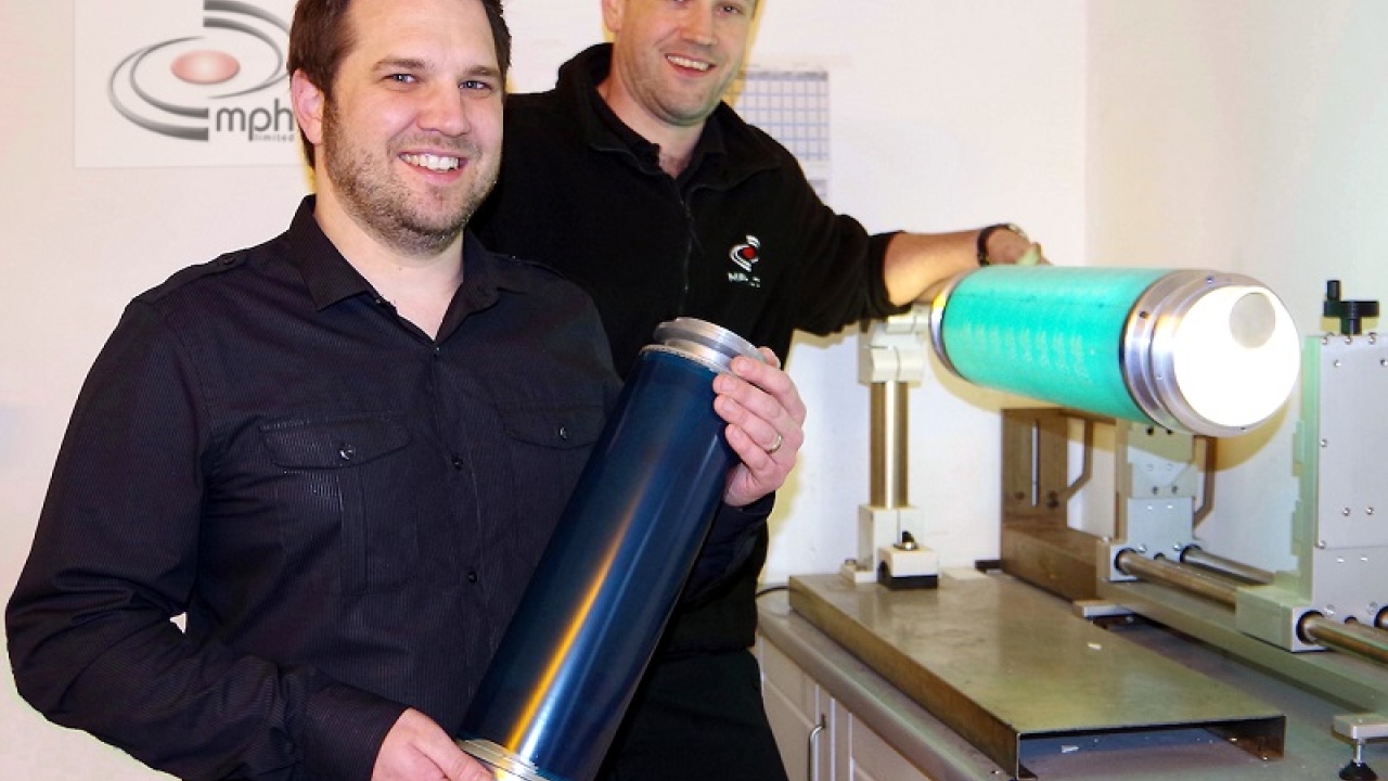 Craig Alderson (left), business development manager, and Lee Hazelton (right), pre-press technician, at MPH, with an SPGPrints’ RotaMesh screen