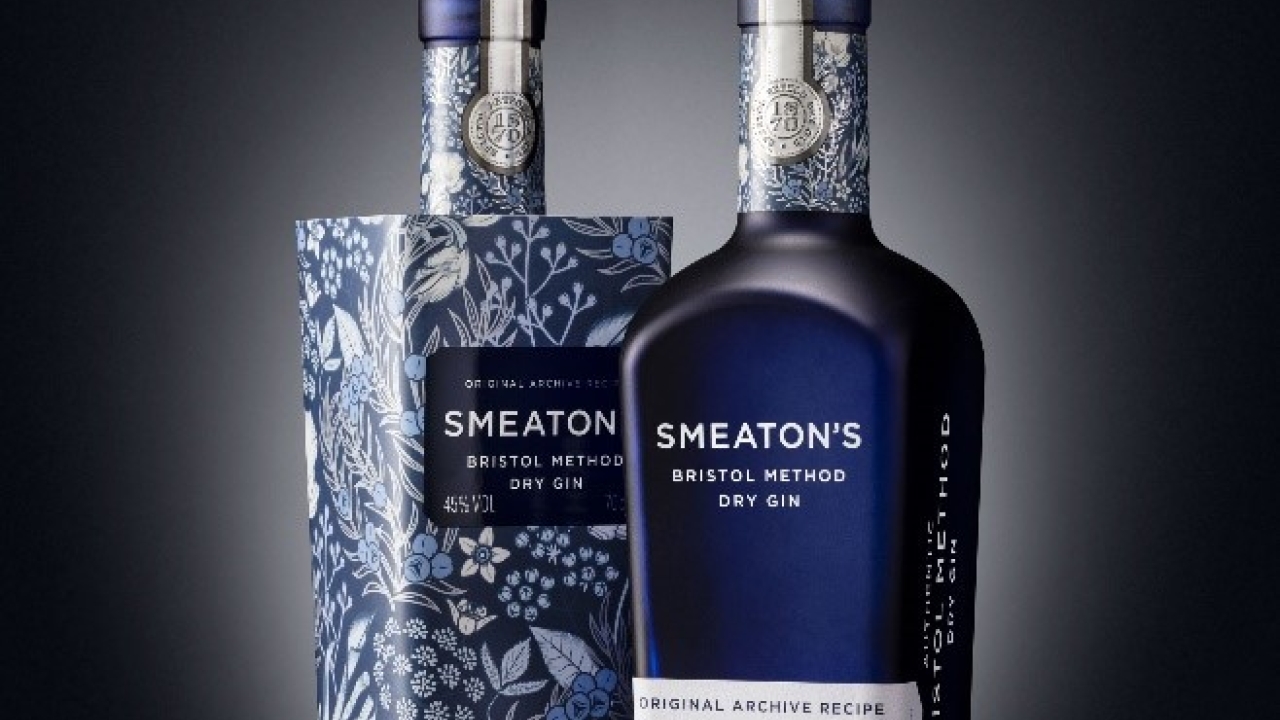 A bespoke print provides an unusual way of highlighting the distinctive long neck of the bottle and led to creating a unique paper wrap