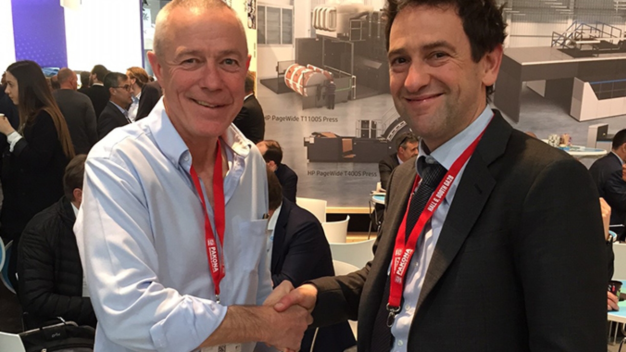 L-R: Mike Burton, ABG’s managing director; Isidore Leiser, Stratus Packaging’s CEO