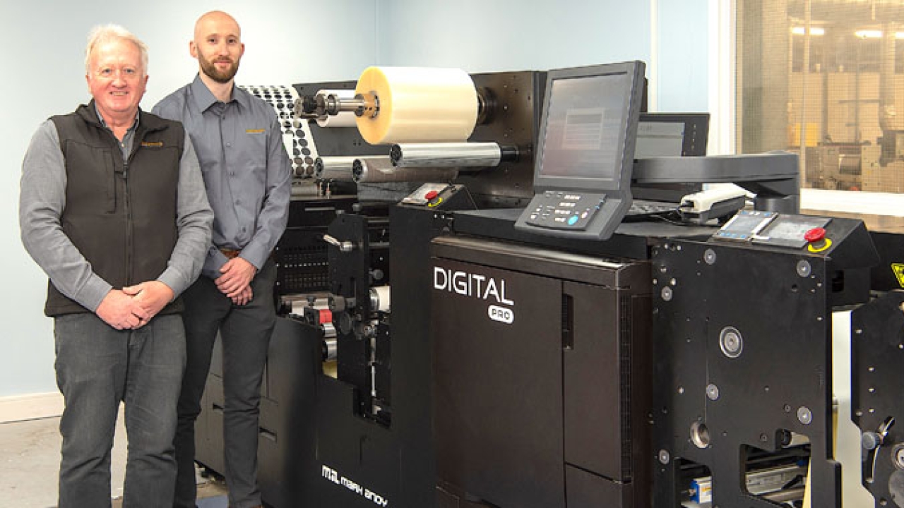 Jon Bird Senior and Junior with Daymark’s new Digital Pro 3, which has shortened production time on one job from three days to one shift