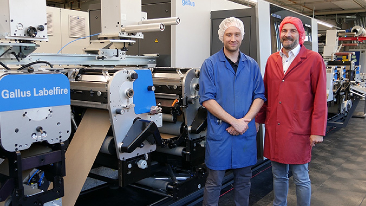 L-R: Tobias Grolimund, head of production and Marcel Häsler, COO at Birkhäuser, in front of the new Gallus Labelfire with low migration equipment.