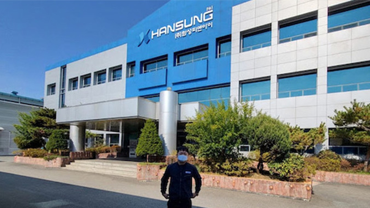 Jung Won Joong, managing director of Hansung and its subsidiary company Dong Yang, in front of the Hansung building in Dae Gu, South Korea.