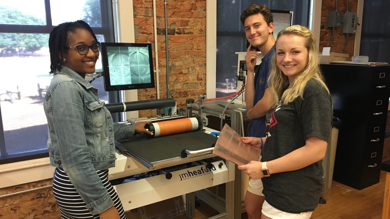 Clemson University students with the JM Heaford FTS plate mounter