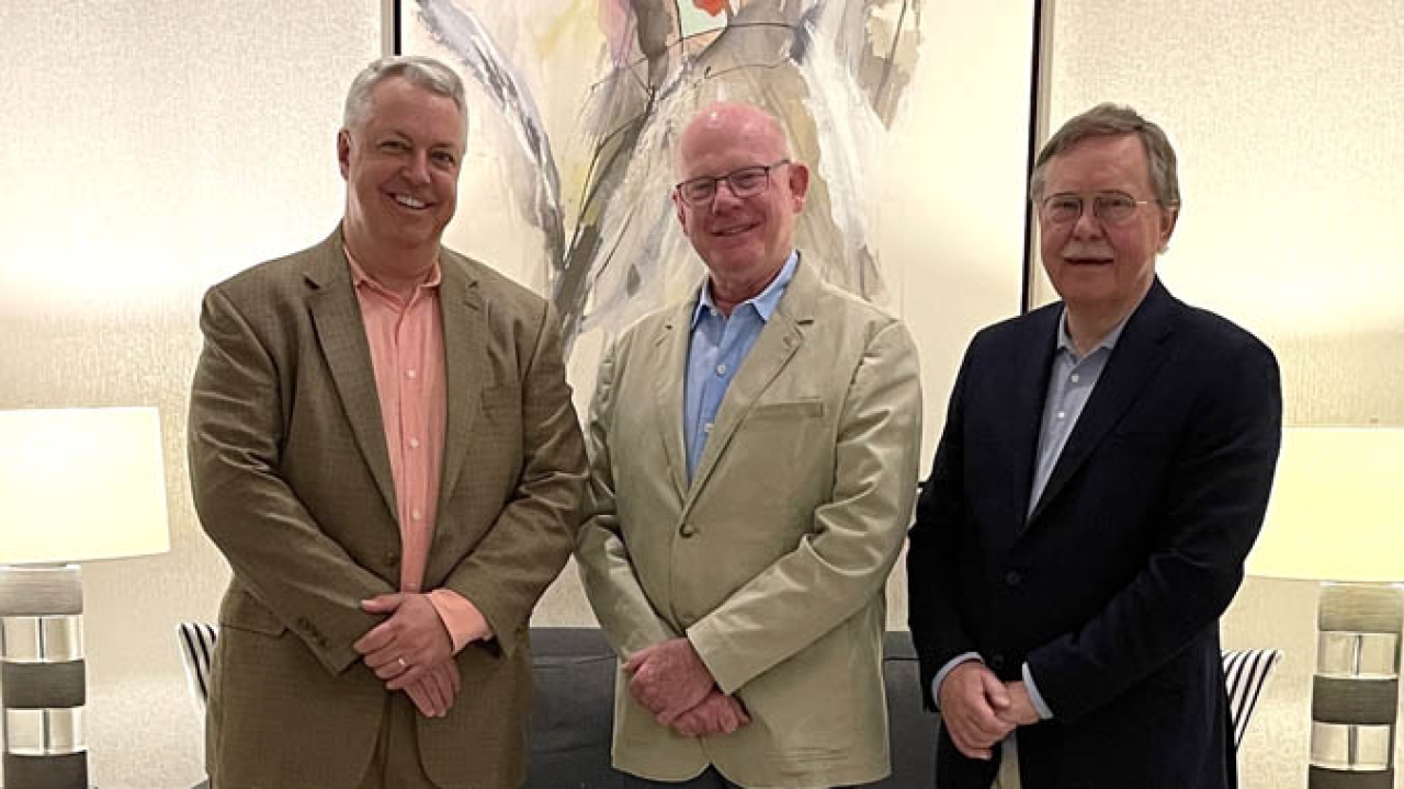 (L-R) Mike Rottenborn, CEO of Hybrid Software Group, Trevor Haworth CEO of Creative Edge and Guido Van der Schueren celebrate the acquisitio