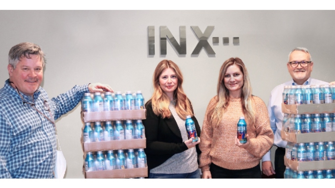 INX representatives Bryce Kristo, Michelle Pack, Dayna Campobasso and John Hrdlick ready the supply of water being shipped to Texas to help with relief efforts. INX representatives Bryce Kristo, Michelle Pack, Dayna Campobasso and John Hrdlick ready the supply of water being shipped to Texas to help with relief efforts.