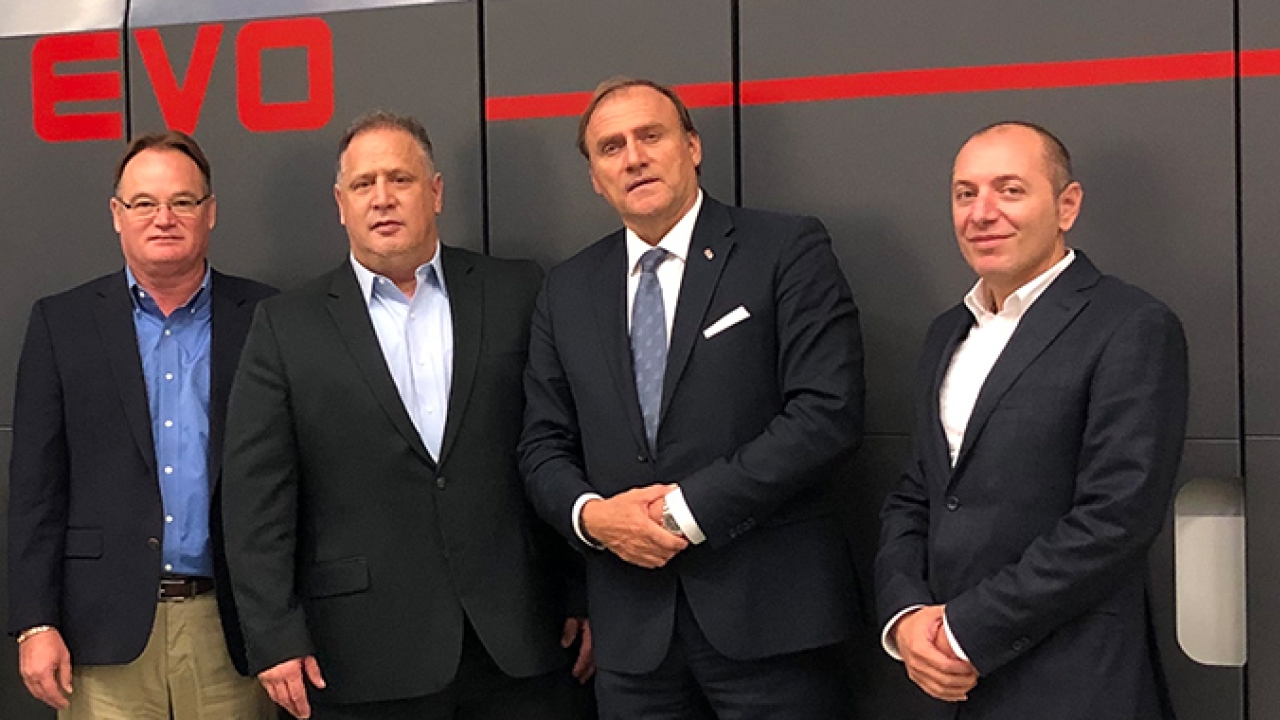 L-R; Randy Vandagriff, president of Enterprise Inkjet Systems Division and vice president of Eastman Kodak Company; Jim Continenza, executive chairman, Eastman Kodak Company; Aldo Peretti, president and CEO of Uteco Group; Riccardo Passerini, sales director Mediterranean & Balkans Region, Enterprise Inkjet Systems Division at Kodak L-R; Randy Vandagriff, president of Enterprise Inkjet Systems Division and vice president of Eastman Kodak Company; Jim Continenza, executive chairman, Eastman Kodak Company; Aldo Peretti, president and CEO of Uteco Group; Riccardo Passerini, sales director Mediterranean & Balkans Region, Enterprise Inkjet Systems Division at Kodak
