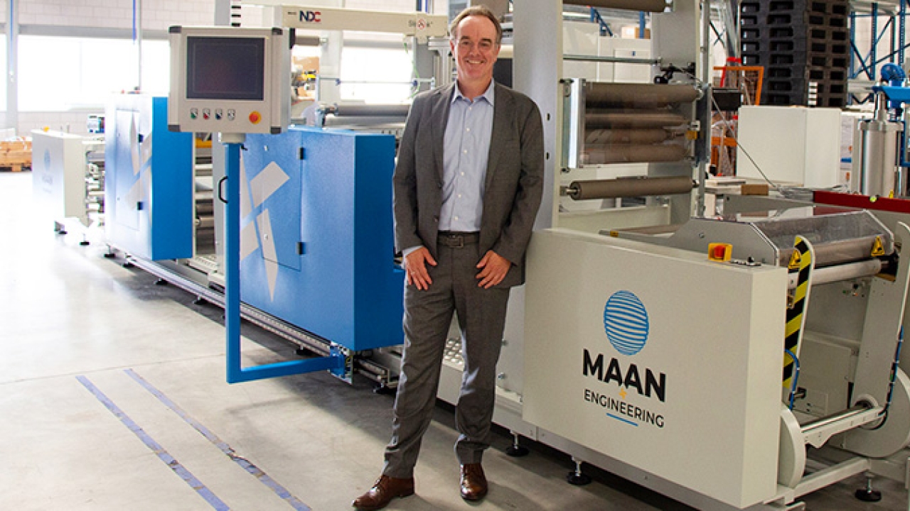 Robert Bongertman, commercial director at Belona in a front of the recently installed Linerless Label Line from Maan Engineering Robert Bongertman, commercial director at Belona in a front of the recently installed Linerless Label Line from Maan Engineering