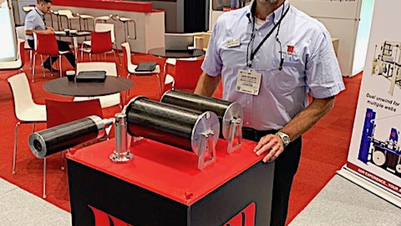 Gavin Rittmeyer, vice president of sales and marketing, demonstrating Martin Automatic Airnertia roller technology for narrow webs