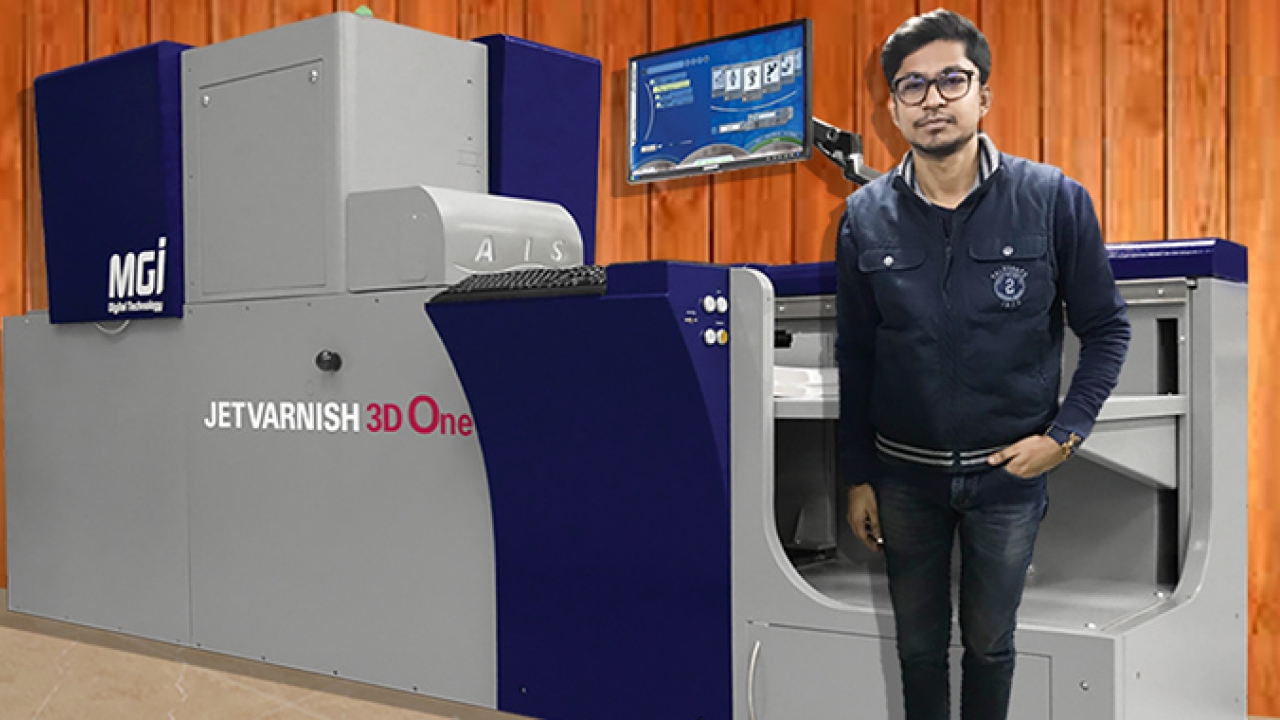 Akshat Jain, director of Bahubali Digiglam in the front of newly installed Konica Minolta MGI Jetvarnish 3D One