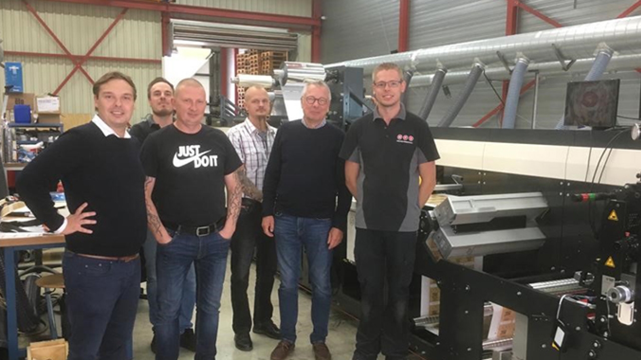 Auraprint Oy team with newly installed MPS flexo press Auraprint Oy team with newly installed MPS flexo press