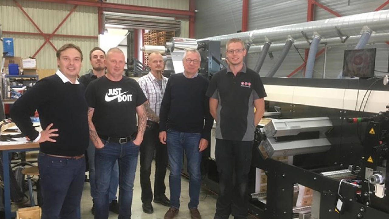 Auraprint Oy team with newly installed MPS flexo press