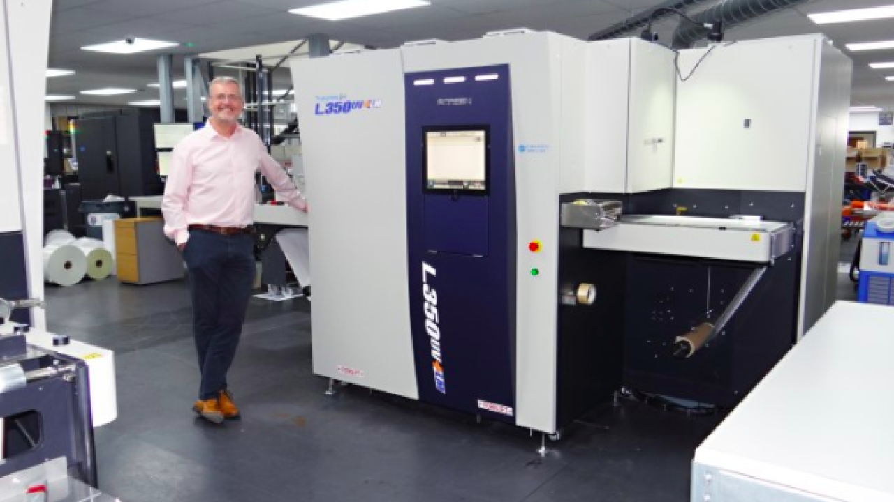 Steve Baker, managing director of Baker Labels with new press