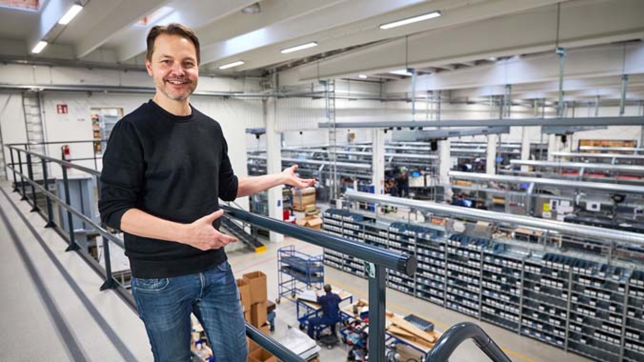 Uffe Nielsen, CEO of GM, shows the factory in Denmark where all machines are produced