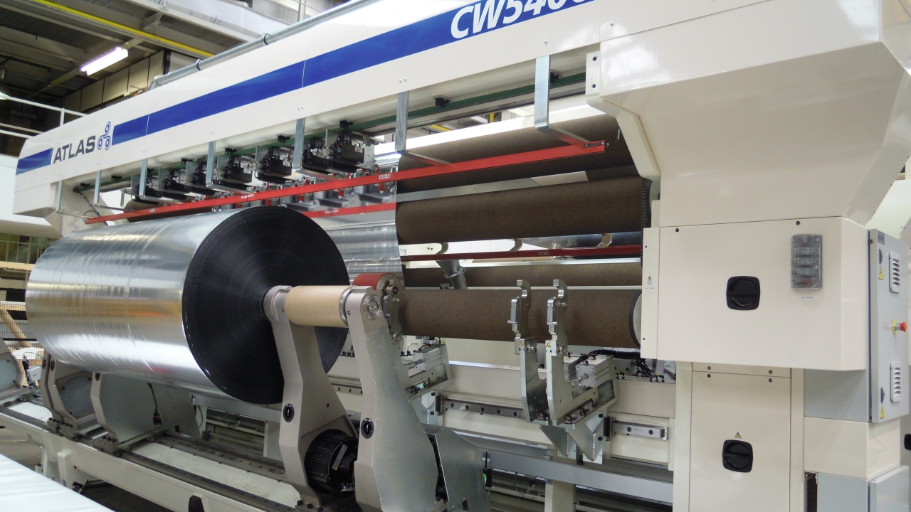 OPP Film has become the first company to install a new 4.8m-wide Atlas CW5400 slitter rewinder