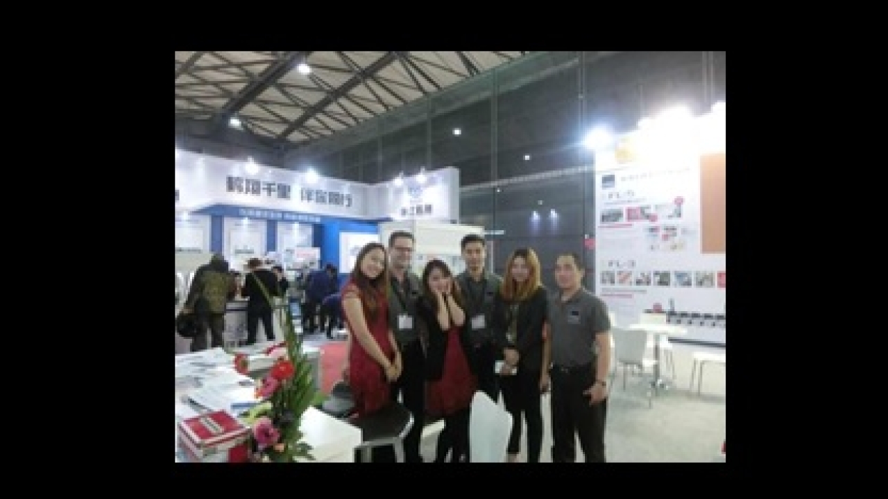 James Boughton alongside Edale Asia Pacific staff at Labelexpo Asia 2013