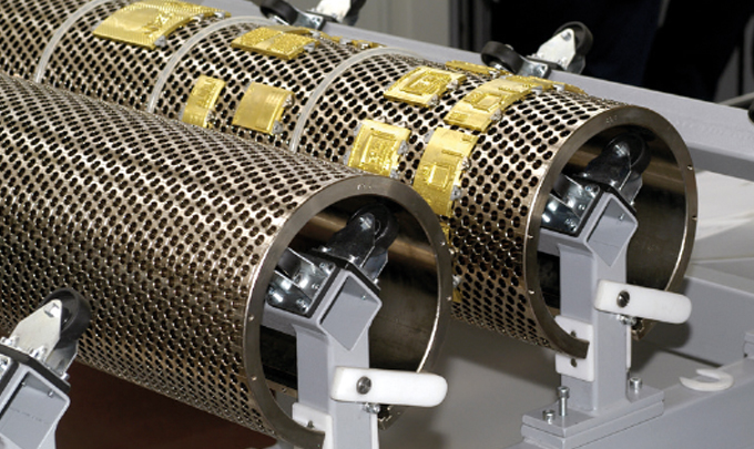 Figure 2.13 - Segmented die - curved brass foiling dies mounted onto a rotary honeycomb base