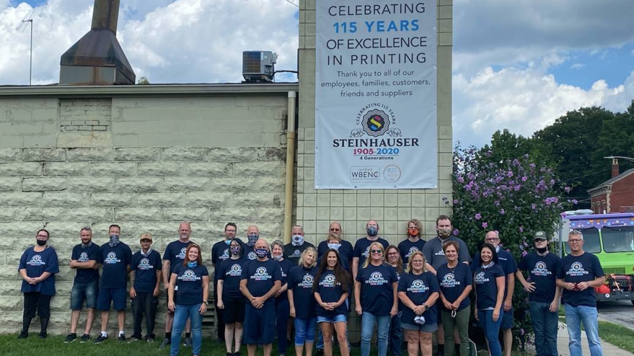 Tara Halpin (front, center) and the Steinhauser team celebrating 115 years in business