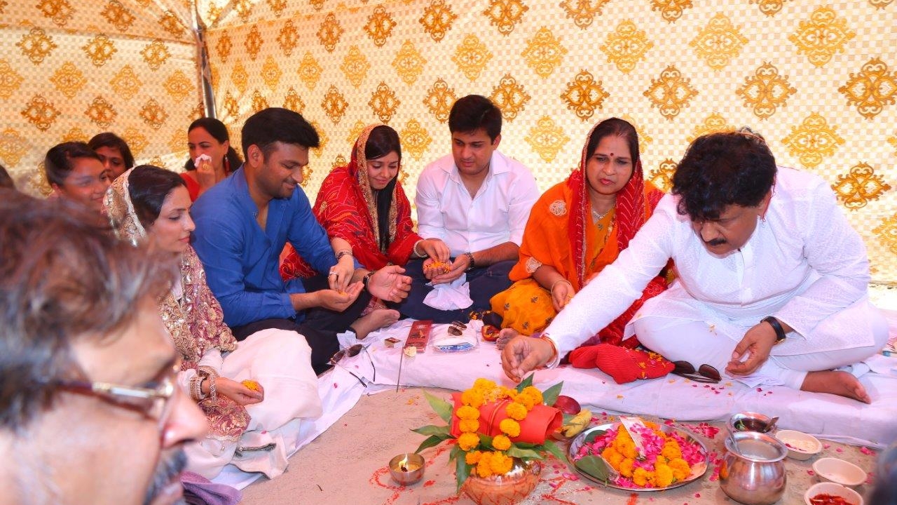 Kuldip Goel, with his family, performing Indian rituals before the construction of his new factory. 